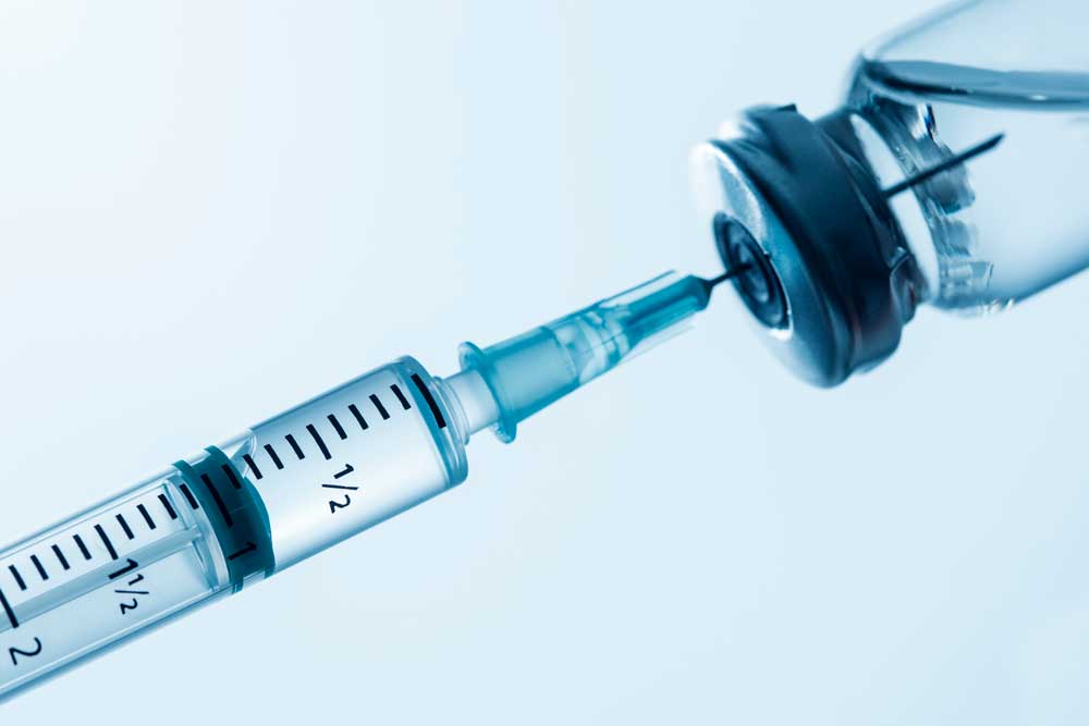 Syringe and vaccine vial