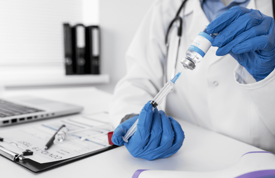 Doctor preparing an injection