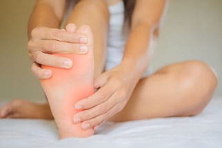 Holding a painful sole