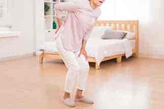 Woman holding her hip